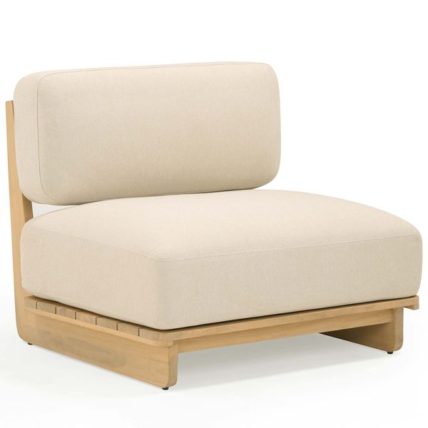 Sofa tapicerowana o zaokraglonej formie z prostym detalem w odcieniu bezu