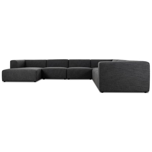 Sofa narozna o klasycznym wykonczeniu z delikatnym akcentem w odcieniu czerni