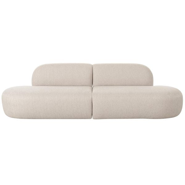 Sofa tapicerowana o zaokraglonej formie z prostym detalem w odcieniu bieli