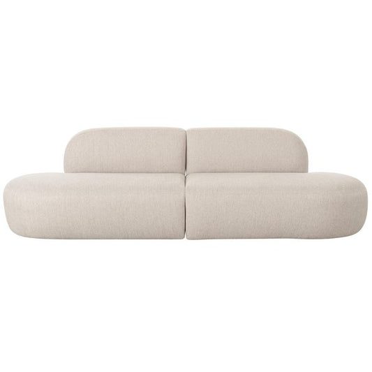 Sofa tapicerowana o zaokraglonej formie z prostym detalem w odcieniu bieli