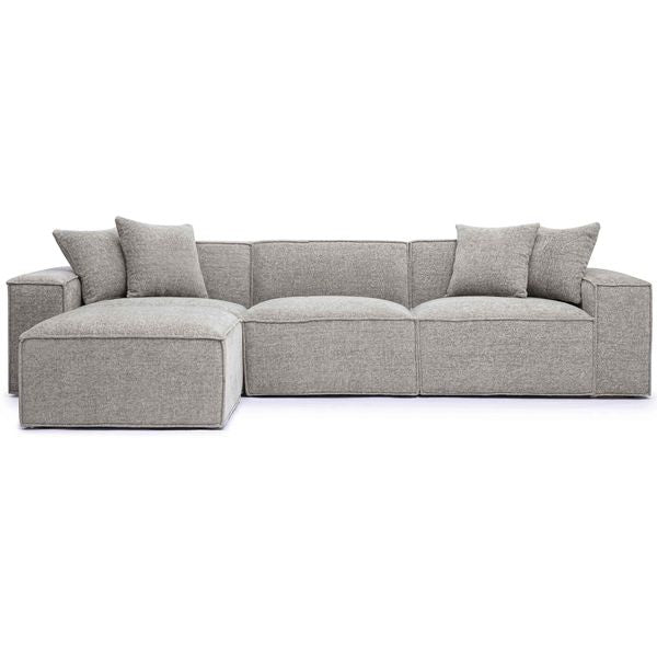 Sofa tapicerowana o zaokraglonej formie z naturalnym charakterem w odcieniu szarosci