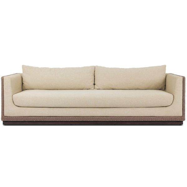 Sofa tapicerowana o lekkiej bryle z wyraznym zarysem w odcieniu bezu