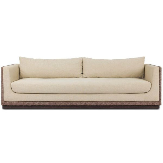 Sofa tapicerowana o lekkiej bryle z wyraznym zarysem w odcieniu bezu